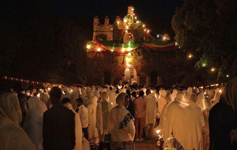 Orthodox faithful gathered in worship at night